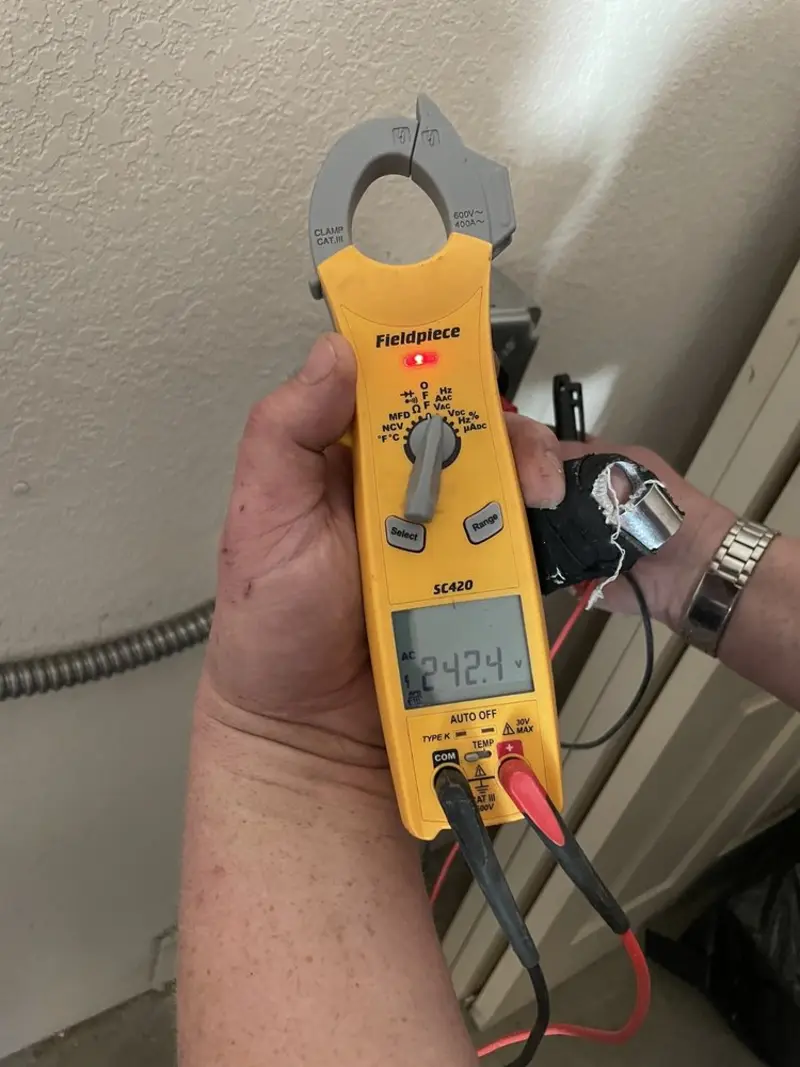 Voltage testing with clamp meter during Generator Installation in Gloucester
